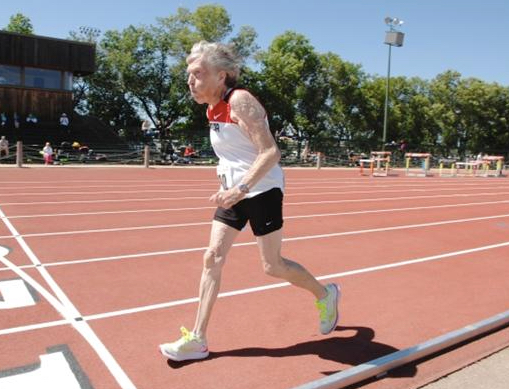 Lenore reaches finish line at a 2013 meet in 