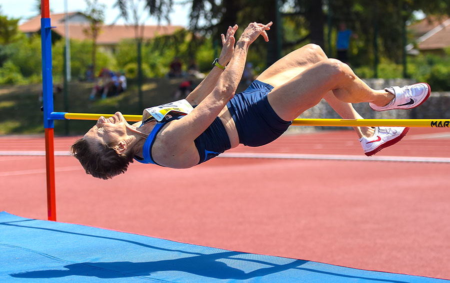 Rita Hanscom soared 4-6 in hep high jump at Lyon. Photos by Rob Jerome
