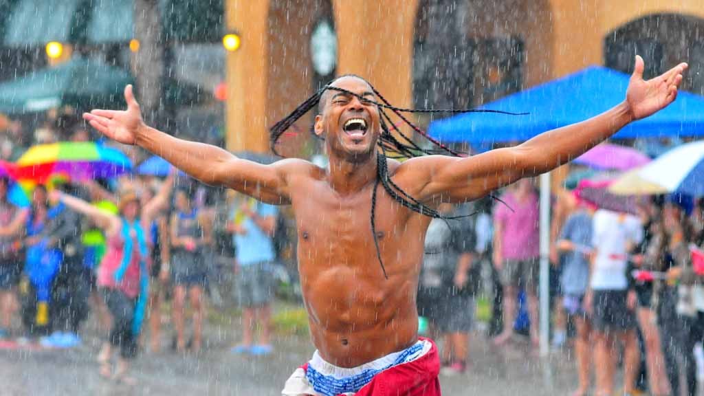 A gent twirled in the rain at San Diego Pride Parade through Hillcrest. Chris Stone photo