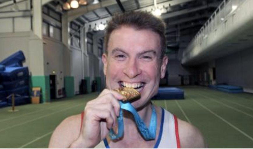 Everyone knows it's obligatory to bite your medal, lest you offend the Tradition Gods.