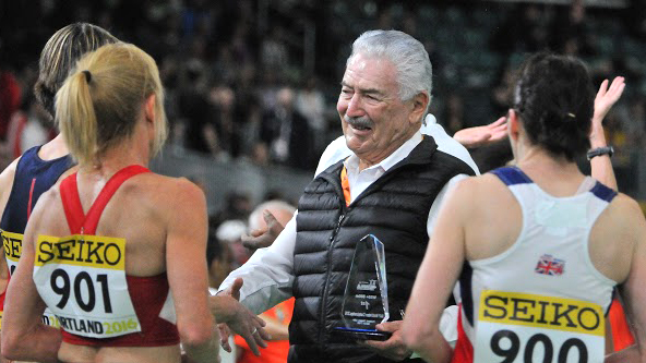 Cesar congratulates women at IAAF Portland W55 800 race.