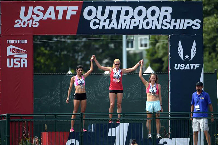 On Hayward Field medal stands, Sonja with Grace Padilla (left) and Andi Camp.