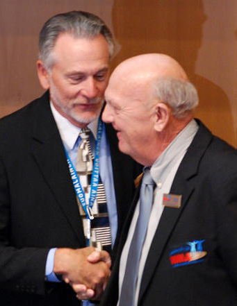 Rex (left) congratulates Stan on one-vote victory in Lahti.