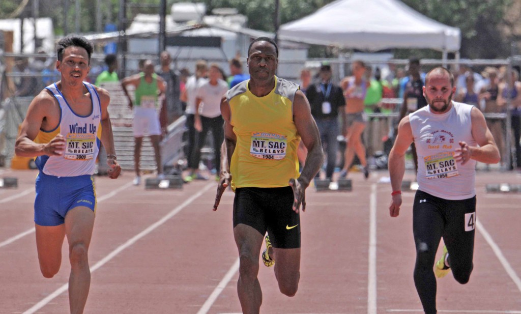 Willie Gault leads the masters 100 field at Mt SAC Relays, beating former Japanese national champion Hiroaki Akabori. Photo by Chris Stone